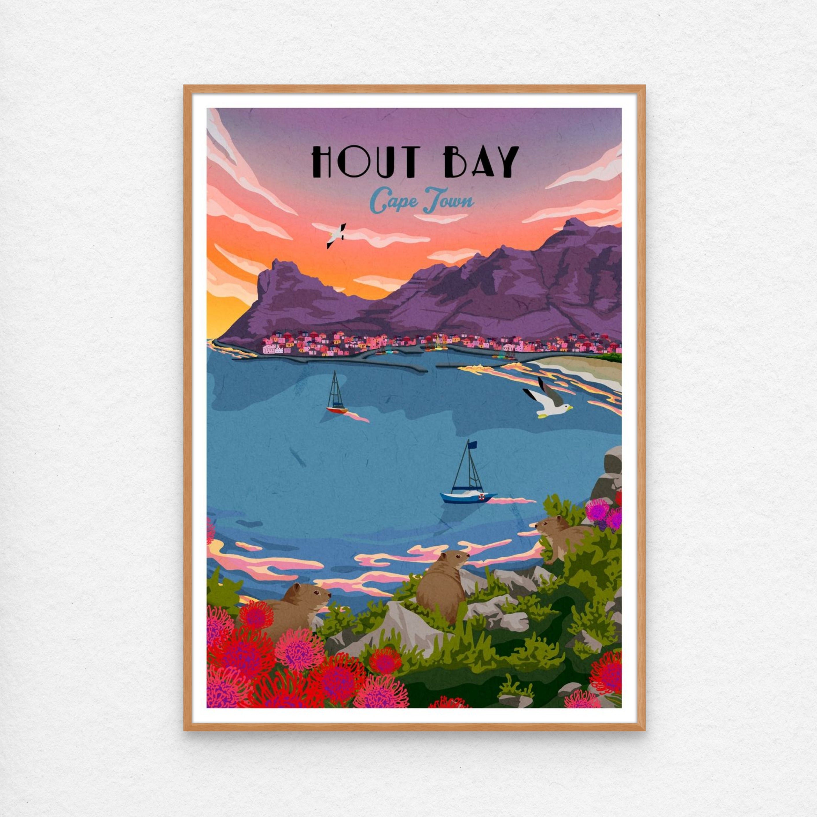 Hout Bay sunset poster wall art with kiaat wood frame. Hout Bay sunset art print – illustrated coastal wall art featuring vibrant sunset over mountains and harbour, perfect for home decor.