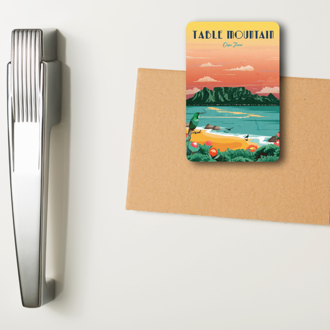 Magnet with a scenic cover featuring Table Mountain, South Africa, on a white fridge