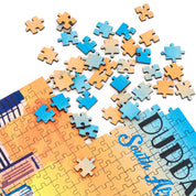 Jigsaw puzzle with partially completed pieces on a white background