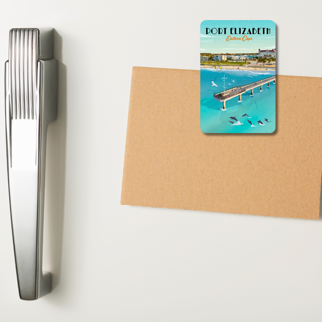 Magnet with a scenic design of a pier and 'Port Elizabeth' text on a white fridge