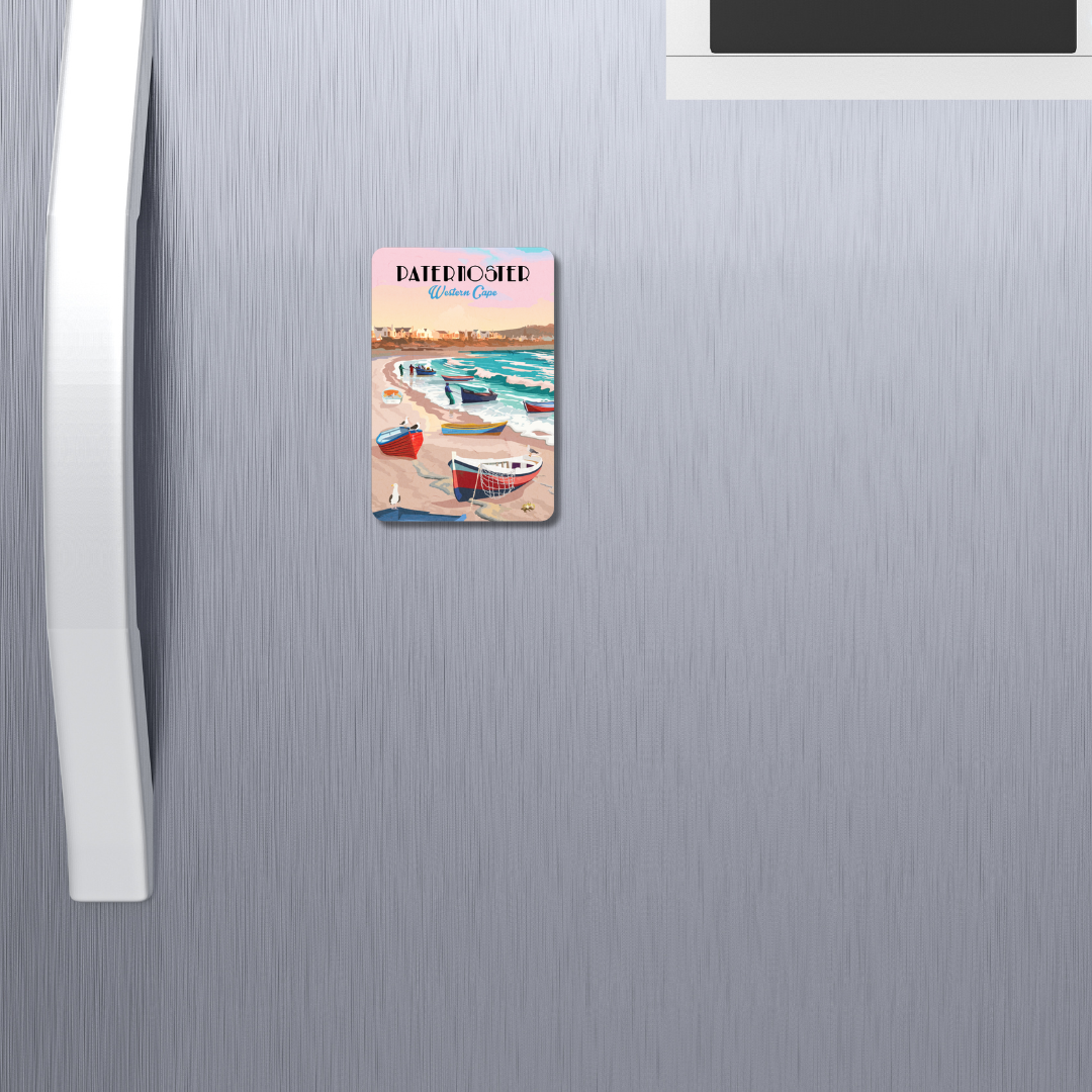 Fridge magnet with a beach scene design attached to a refrigerator.