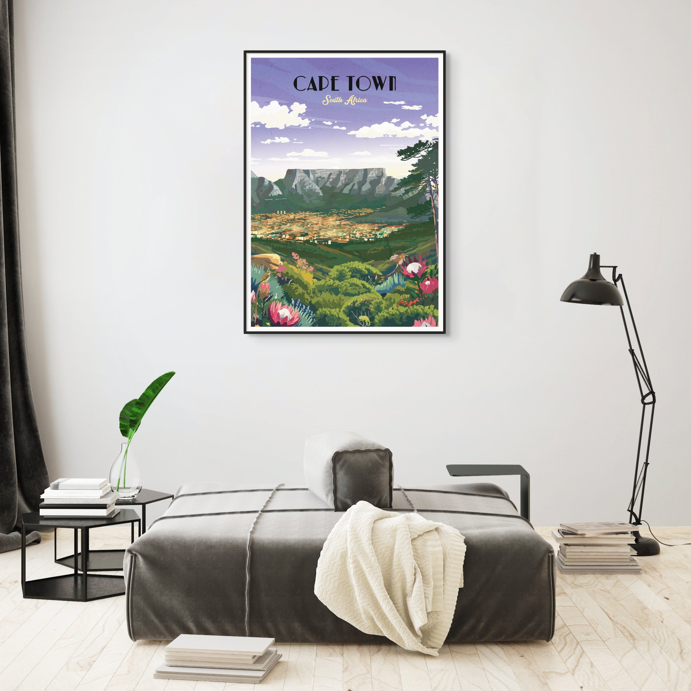 Poster of Cape Town on a wall above a bed in a bedroom