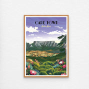 Framed artwork of Cape Town, South Africa with a mountainous landscape and city lights.