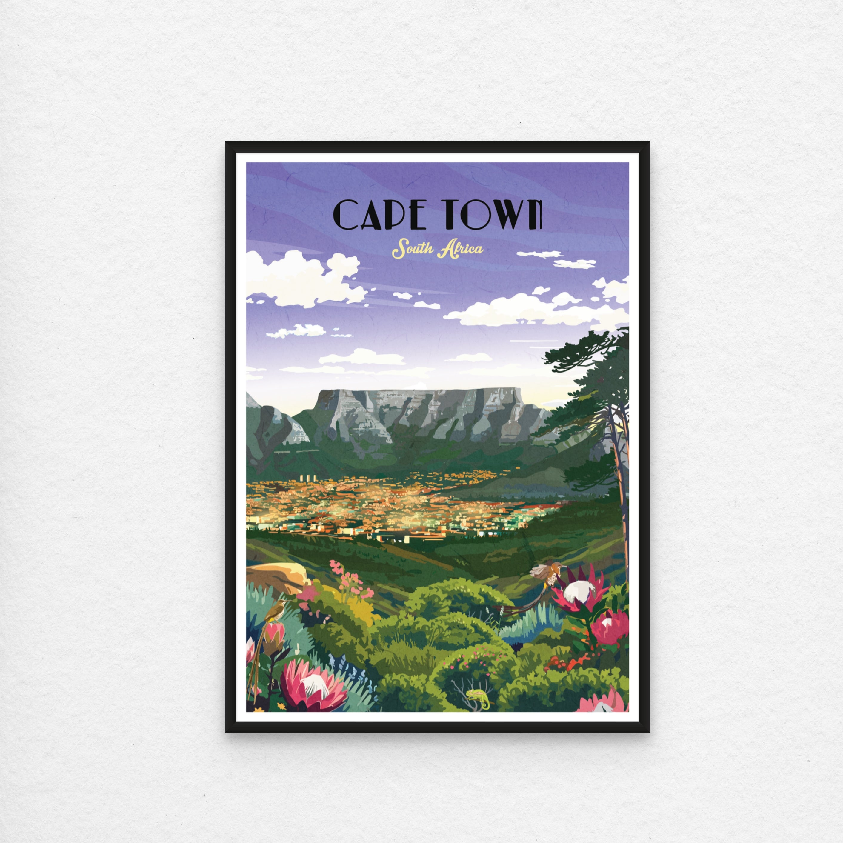 Framed artwork of Cape Town, South Africa with mountains and flowers.