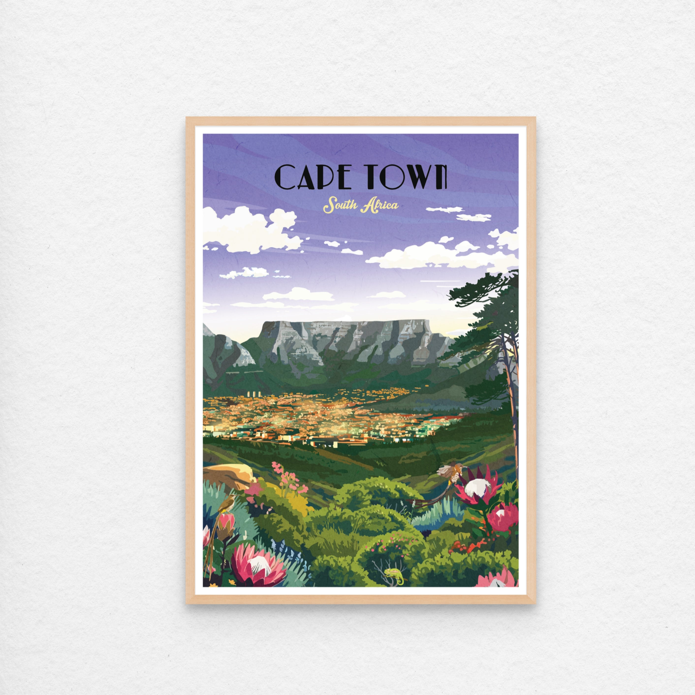 Framed artwork of Cape Town with mountains and cityscape on a purple background